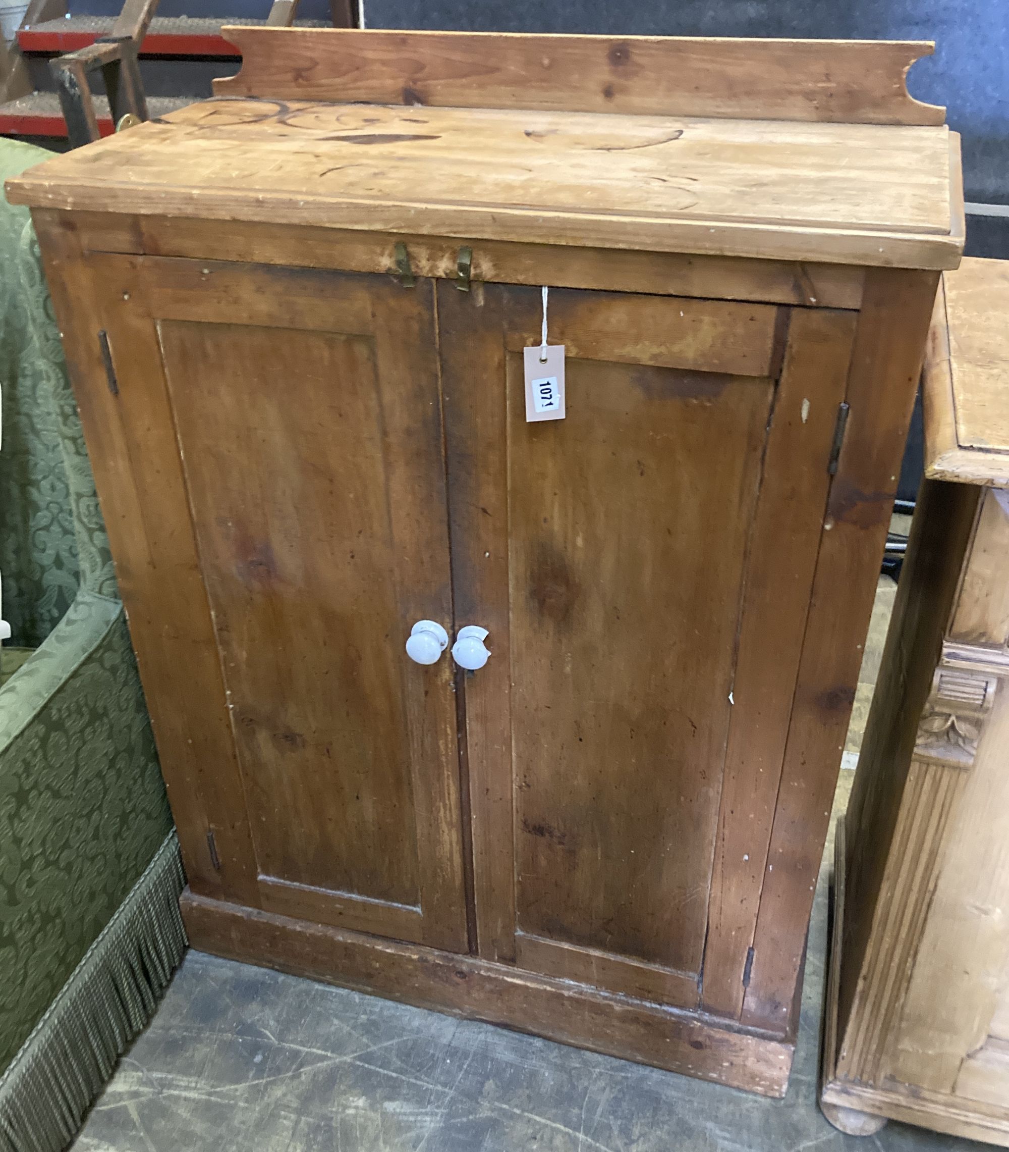 A Victorian pine two door cabinet, width 83cm, depth 38cm, height 115cm